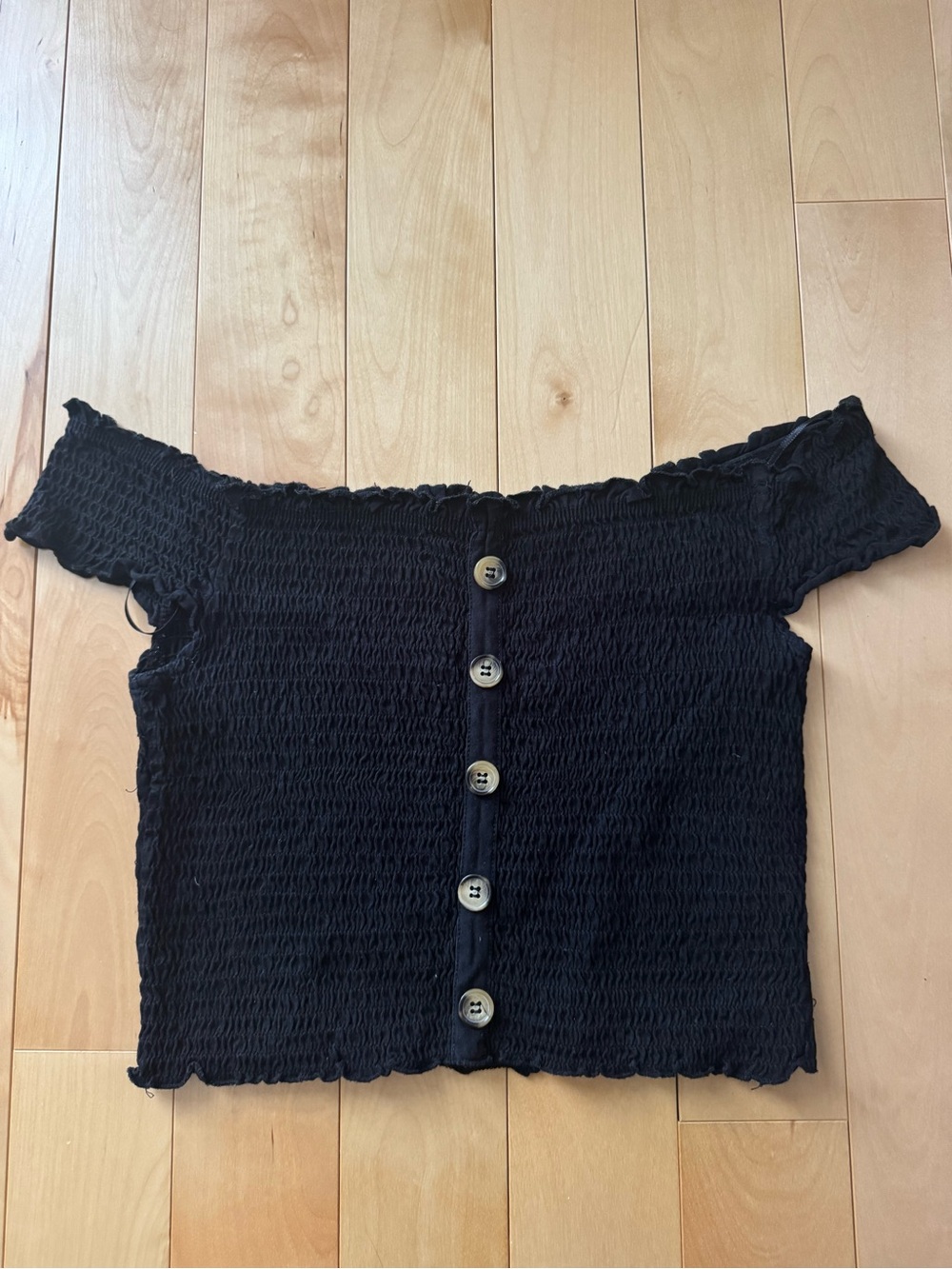 Women’s black off-shoulder button-front crop top (L)